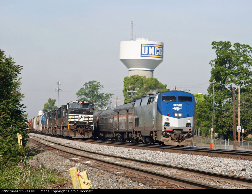 AMTK 66 leads train 80 past NS train 351